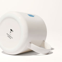 Bottom view of the blue bottle mug. 