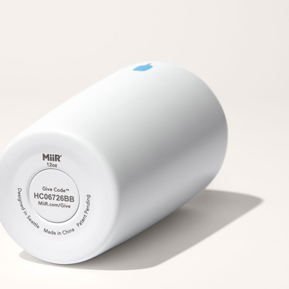 Bottom of the Miir Commuter Cup displaying the give code.